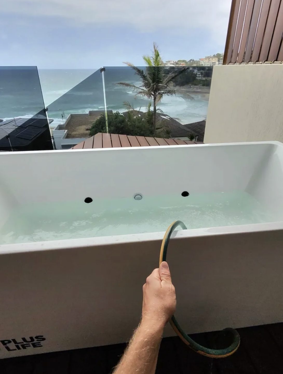Residential cold plunge with ocean view